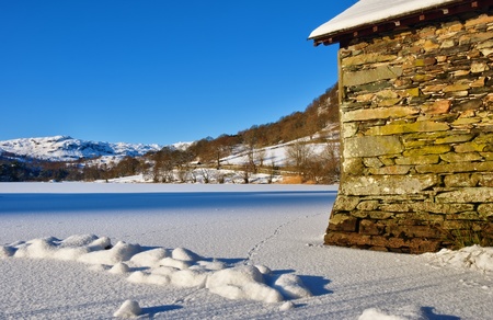 A Boathouse on frozen Rydal Waterの写真素材