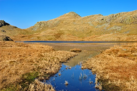 A view of the mountain tarn called "Tarn at Leaves"  in the English Lake District National Parkの写真素材