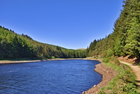 Path on the shore of Turton & Entwistle Reservoir, Lancashire Englandの写真素材