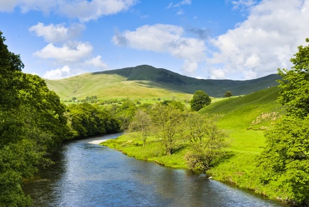 Scenic view of the River Lune with the Howgill hills in the background. Lowgill, Cumbria, England.の写真素材