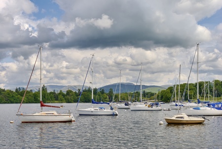 Moored boats at Bowness-on-Wnidermere  in the English Lake District National Parkの写真素材
