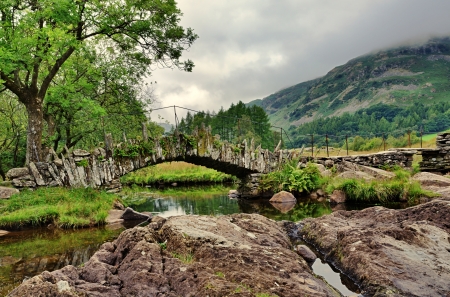 A stone built Packhorse bridge at Little Langdale in the English Lake District