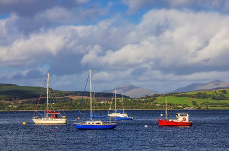Boats in the Gourock bay on the river Clyde near Inverclyde, Scotland.の写真素材