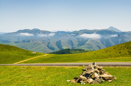 Scenic Summer view of grazing meadows in the French pyrenees near Saint-Jean-Pied-de-Port.の写真素材