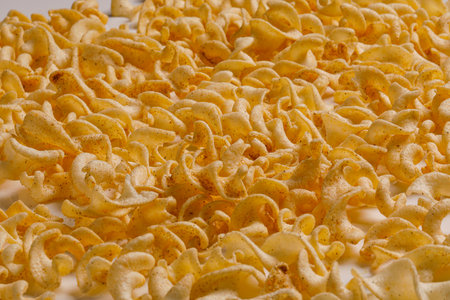 Crispy Potato Chips - fried or baked sliced banana isolated on white background.