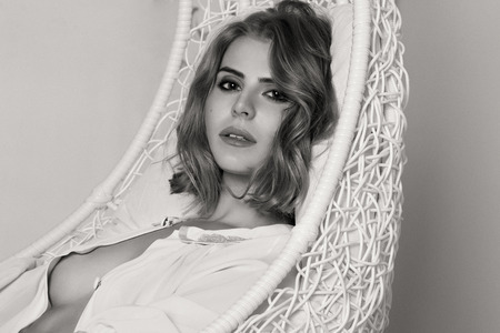 Beautiful sexy girl, blond, interior studio, white backgroundの写真素材