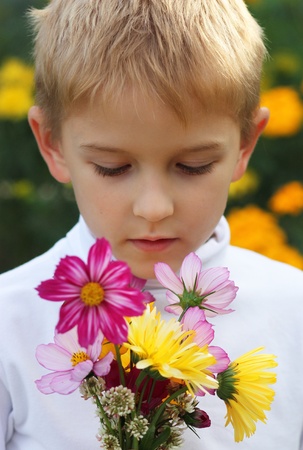 Boy with a bouquetの写真素材