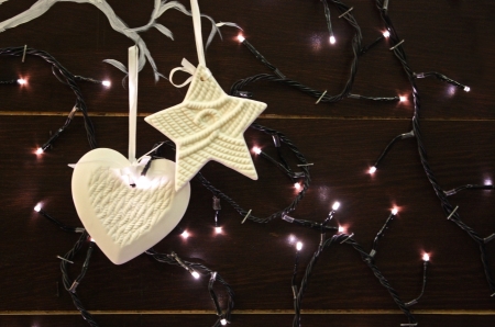 Beautiful shiny Christmas lights and decoration  in the shape of heart and star の写真素材