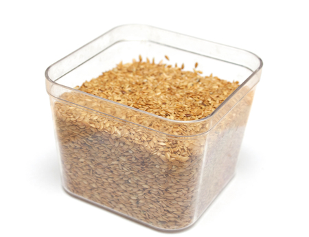 Flax Seeds in a box on Whiteの写真素材