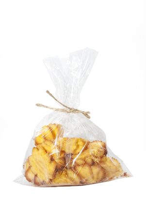Ð¡ookies in  transparent bag on white backgroundの写真素材
