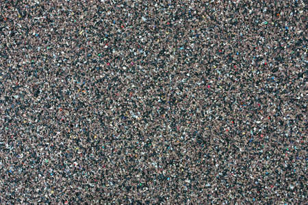 The protective brown coating of crumb rubber