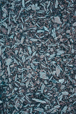 Texture of a frozen surface on a rubber mulch floorの写真素材
