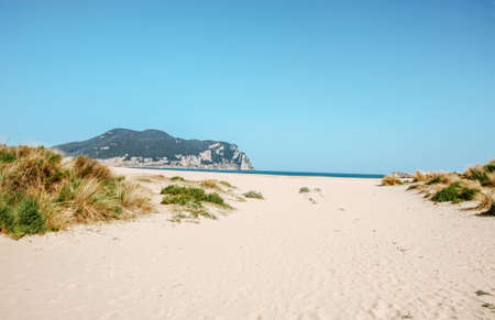 Beach against the backdrop of mountains in the city of Laredo, Cantabria, Spain.