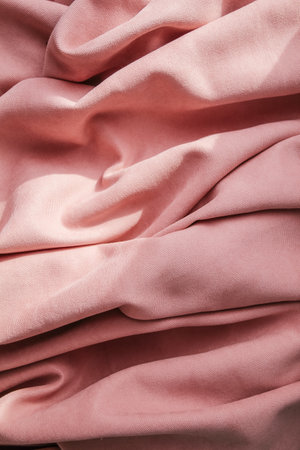Folds of pink fabric, abstract backgroundの写真素材
