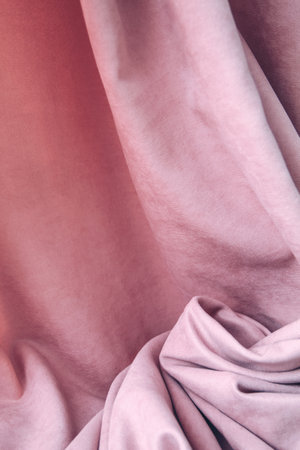 Folds of pink fabric, abstract backgroundの写真素材