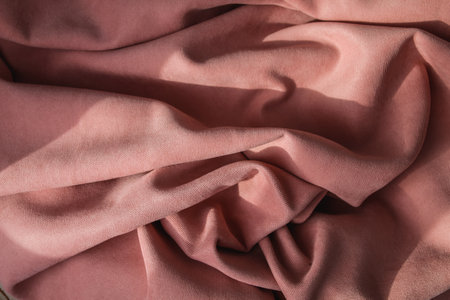 Folds of pink fabric, abstract backgroundの写真素材