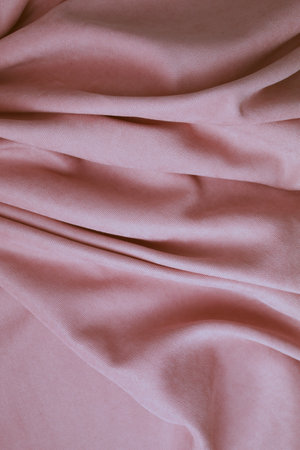 Folds of pink fabric, abstract backgroundの写真素材