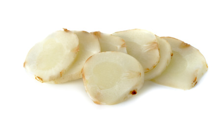 Slice young galangal isolated on the white background.の写真素材