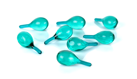 Hair serum capsule isolated on the white background.の写真素材