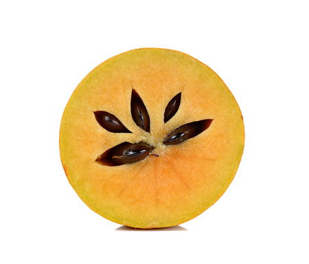 Sliced Sapodilla isolated on the white background.の写真素材