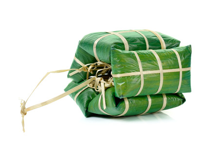 fermented ground pork in banana leaf packing isolatedの写真素材