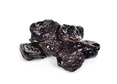 Dried Prune isolated on the white background.の写真素材
