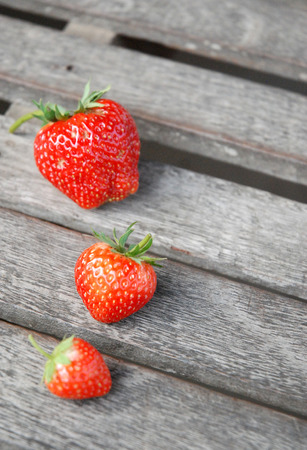 Strawberry Juice on teak floorsの写真素材