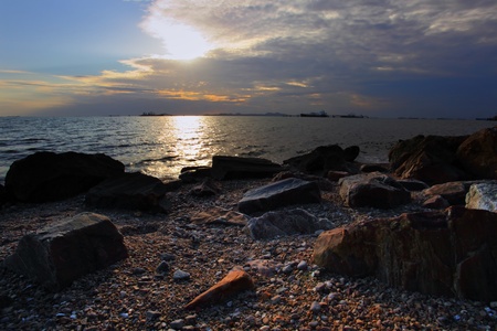 sunset at rock beachの写真素材