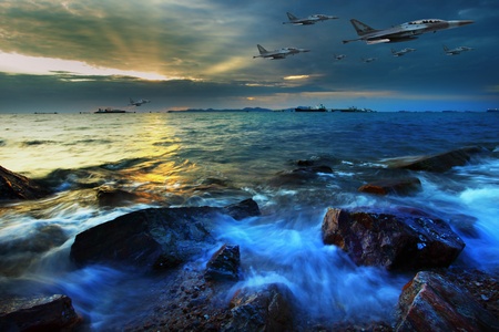 jet plane flying over sea coast in dusky time movies sceneの写真素材