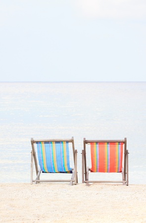 beach chairs on sand beachの写真素材
