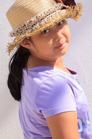 girls and straw hatの写真素材