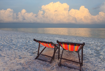 couples of chairs beach at sea sideの写真素材