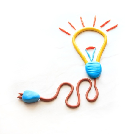 electric bulb icon on white background by colorful clay children styleの写真素材