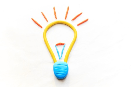 electric bulb icon on white background by colorful clay children styleの写真素材