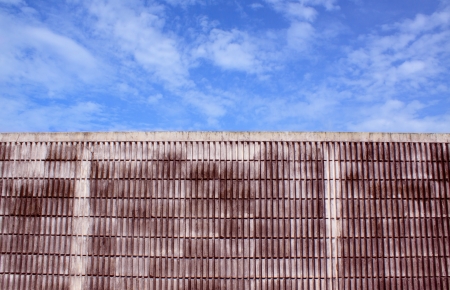 cement concrete  wall and blue sky white cloudsの写真素材