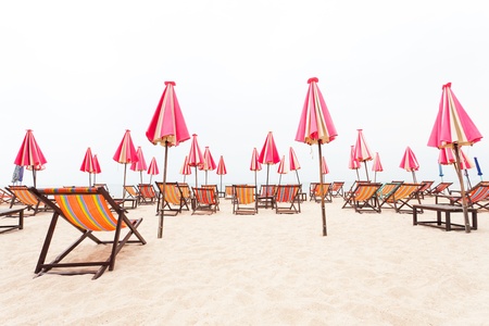 chairs beach and umbrella on sand beachの写真素材