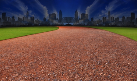 running track and blue sky background and city buildingの写真素材
