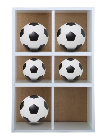 soccer football in white wood box shelfの写真素材