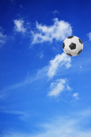 floating football on skyの写真素材