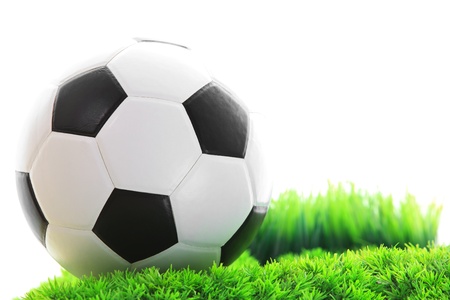 soccer football on green grass fieldの写真素材