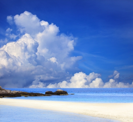 sand beach and blue sky in cloudy dayの写真素材