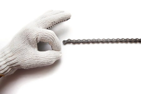 hand with hand gloves sign o k  with chain line on white background mean all rightの写真素材