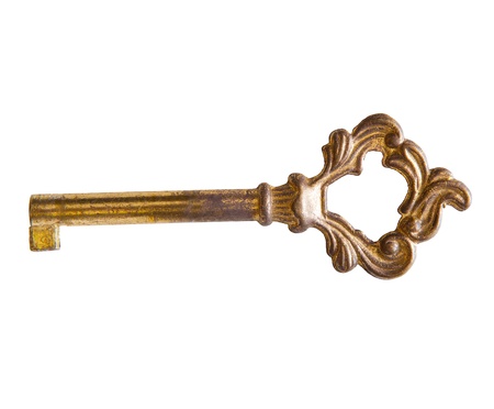 golden key isolated on white background の写真素材