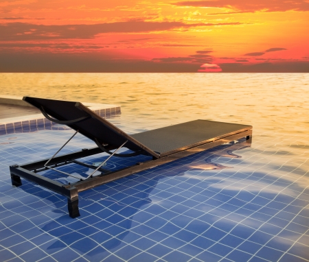 pool bed and dusky sky sun setの写真素材