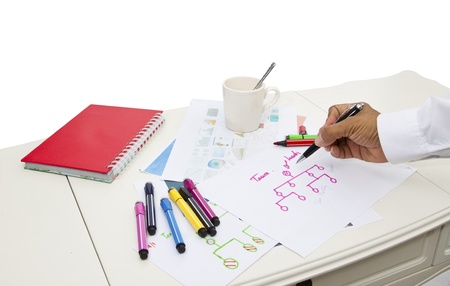 working business table and graph background isolate whiteの写真素材