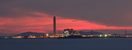 heavy industry in industrial estate and beautiful dramatic sky twilight of a day use for industry and green environmentの写真素材