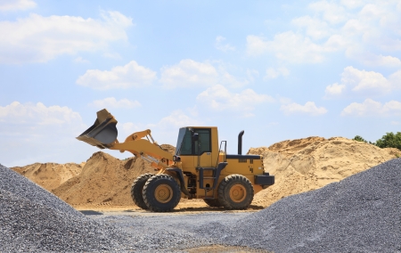 yellow tractor on construction site use for multipurpose sceneの写真素材