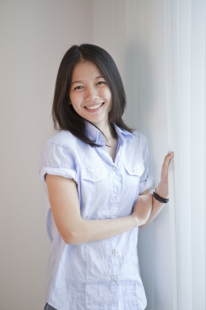 natural face with no make up of asian teen  and smiling to cameraの写真素材