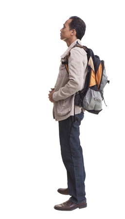 side view of backpacker standing on white  use for multipurposeの写真素材