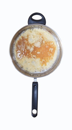 omlette cooking in panの写真素材
